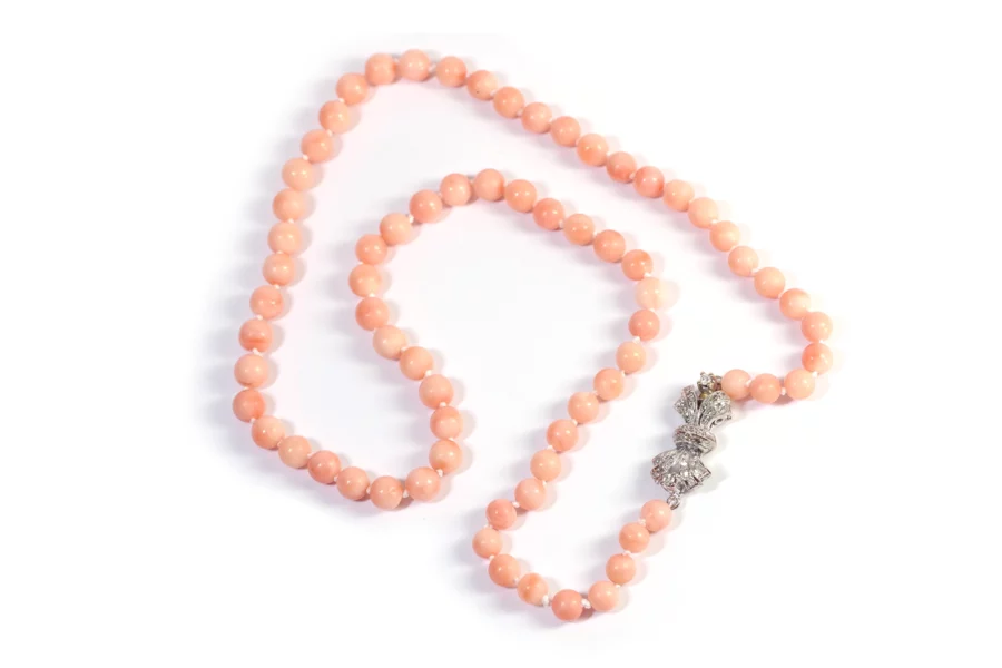 Coral angel skin necklace with diamond clasp