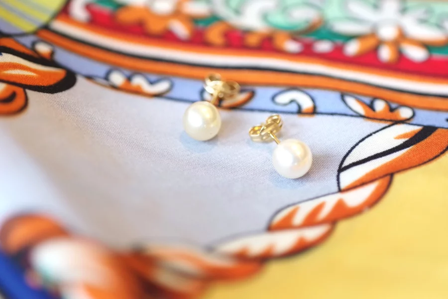 pearl earrings in gold
