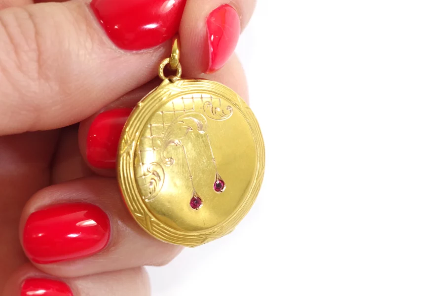 Garnet gold locket pendant