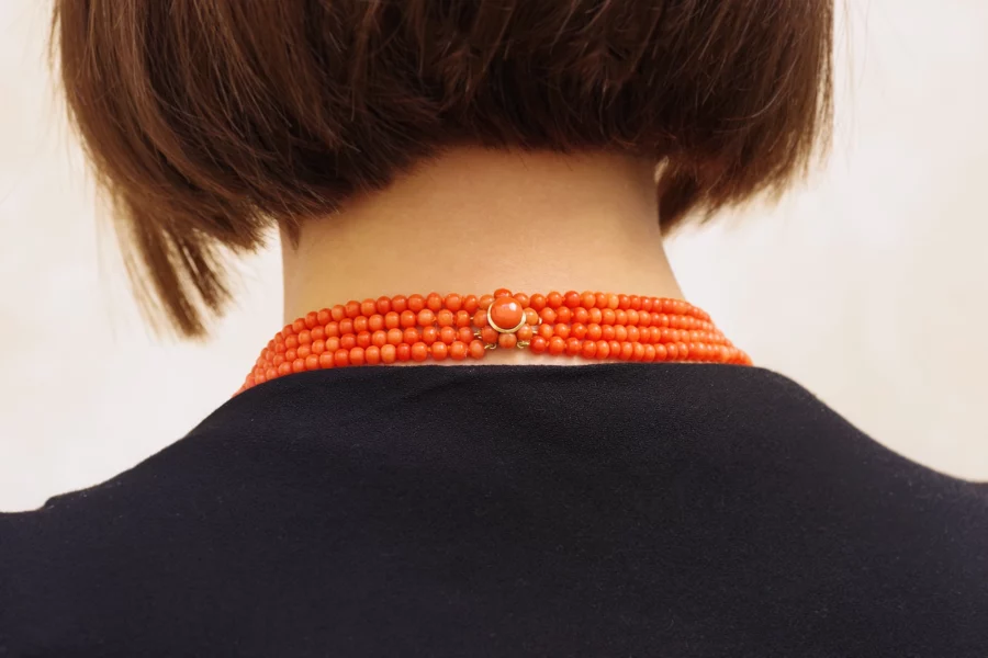 Coral pearls necklace with a gold clasp