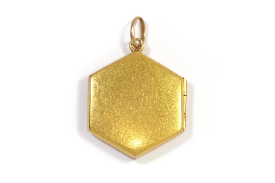 Antique gold opening pendant