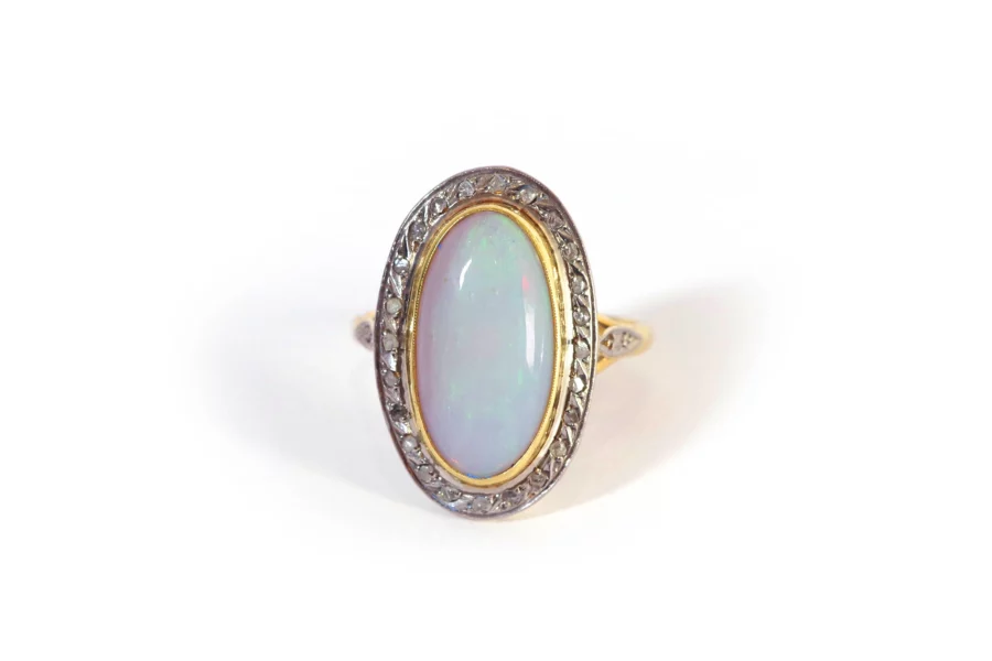 Opal diamond ring in platinum