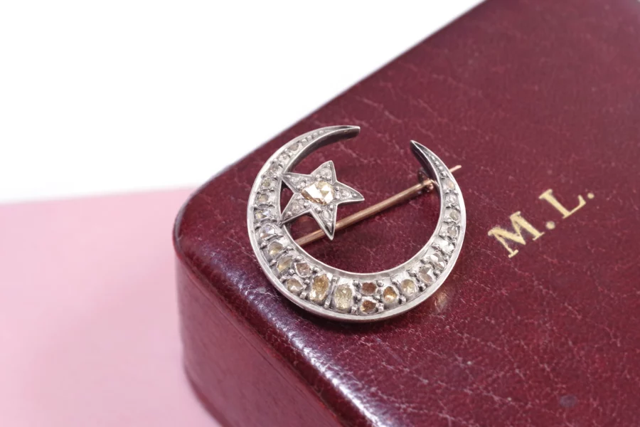 Moon diamond brooch in gold and silver