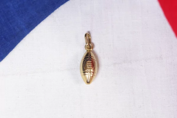 18k gold rugby ball pendant