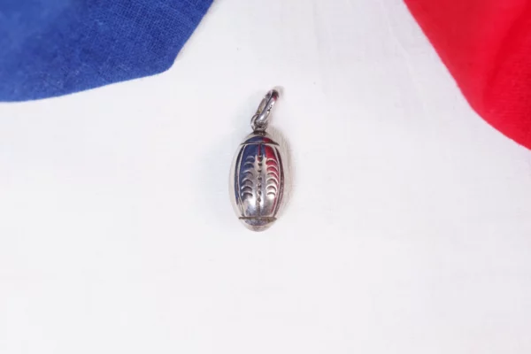 vintage rugby ball pendant in silver