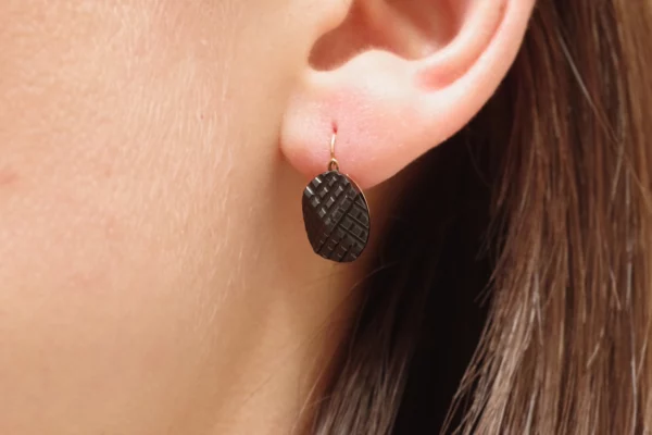 Black gold single mono earring