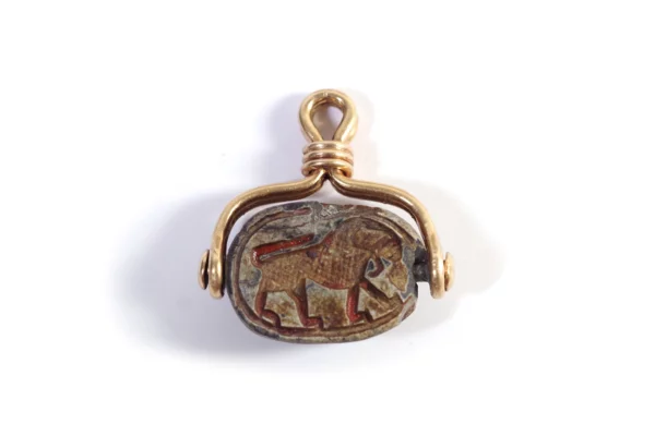 swivel egyptian pendant gold