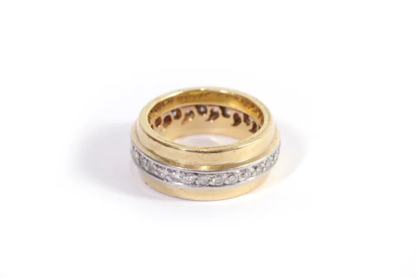 Modernist diamond ring in gold