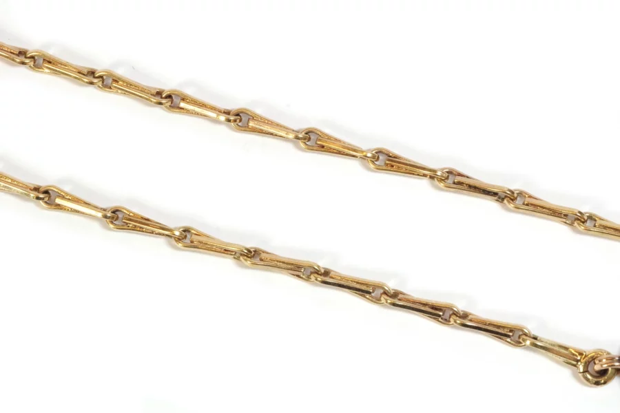 Antique slender watch chain in gold